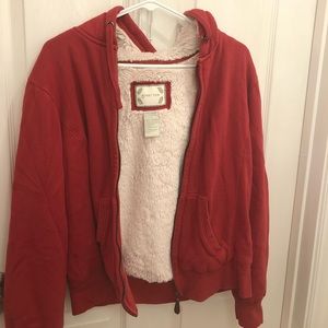 Red fuzzy zip-up hoodie